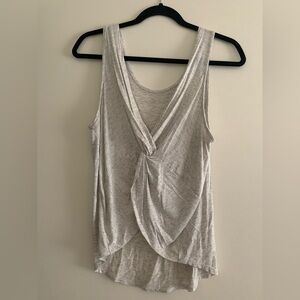 Light grey tank. Twisted open back (pictured). Size medium